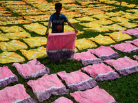 Bangladeshi labors working in the Batik Cloth industry at Narsingdi area near Dhaka, Bangladesh, on April 26, 2018. Each Worker earns par da...