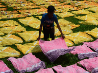 Bangladeshi labors working in the Batik Cloth industry at Narsingdi area near Dhaka, Bangladesh, on April 26, 2018. Each Worker earns par da...