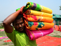 Bangladeshi labors working in the Batik Cloth industry at Narsingdi area near Dhaka, Bangladesh, on April 26, 2018. Each Worker earns par da...