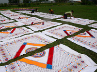 Bangladeshi labors working in the Batik Cloth industry at Narsingdi area near Dhaka, Bangladesh, on April 26, 2018. Each Worker earns par da...