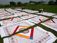 Bangladeshi labors working in the Batik Cloth industry at Narsingdi area near Dhaka, Bangladesh, on April 26, 2018. Each Worker earns par da...