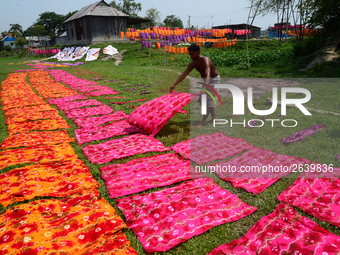 Bangladeshi labors working in the Batik Cloth industry at Narsingdi area near Dhaka, Bangladesh, on April 26, 2018. Each Worker earns par da...