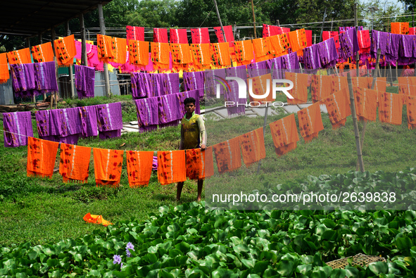 Bangladeshi labors working in the Batik Cloth industry at Narsingdi area near Dhaka, Bangladesh, on April 26, 2018. Each Worker earns par da...