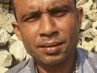  A stone breaking worker is working in a field in a heated mid-summer day on April 27th 2018, in Dhaka, Bangladesh. (