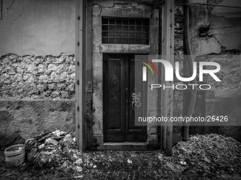 Damaged building in the historic center of L'Aquila, severely damaged after the earthquake of April 6, 2009. (