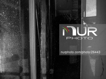 Damaged building in the historic center of L'Aquila, on Januaury 11, 2014.(