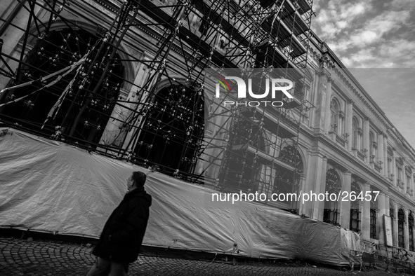 Man walks in the historic center of L'Aquila, severely damaged after the earthquake of April 6, 2009. 