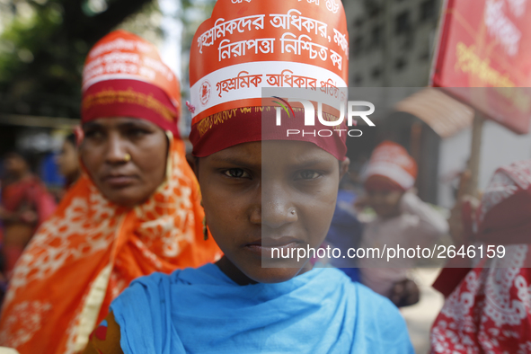 Bangladeshi garment workers take part in a May Day protest rally in Dhaka, Bangladesh on May 01, 2018. Thousands of workers of several occup...