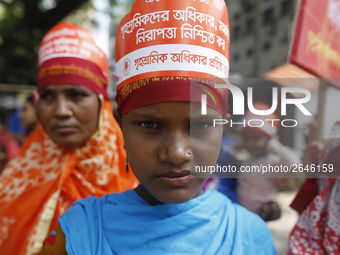 Bangladeshi garment workers take part in a May Day protest rally in Dhaka, Bangladesh on May 01, 2018. Thousands of workers of several occup...