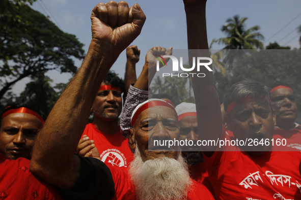 Bangladeshi workers take part in a May Day protest rally in Dhaka, Bangladesh on May 01, 2018. Thousands of workers of several occupations t...