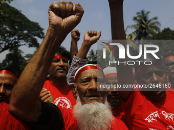 Bangladeshi workers take part in a May Day protest rally in Dhaka, Bangladesh on May 01, 2018. Thousands of workers of several occupations t...