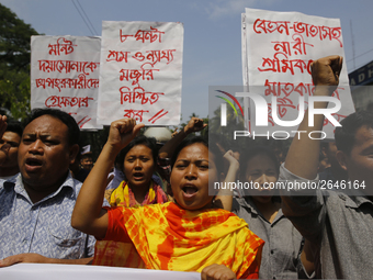 Bangladeshi workers shout slogans as they attend a May Day protest rally in Dhaka, Bangladesh on May 01, 2018. Thousands of workers of sever...