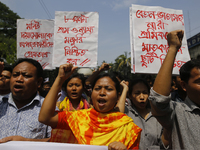 Bangladeshi workers shout slogans as they attend a May Day protest rally in Dhaka, Bangladesh on May 01, 2018. Thousands of workers of sever...