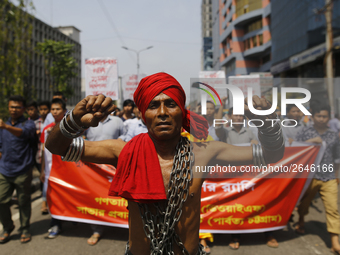 Bangladeshi workers shout slogans as they attend a May Day protest rally in Dhaka, Bangladesh on May 01, 2018. Thousands of workers of sever...