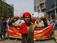 Bangladeshi workers shout slogans as they attend a May Day protest rally in Dhaka, Bangladesh on May 01, 2018. Thousands of workers of sever...