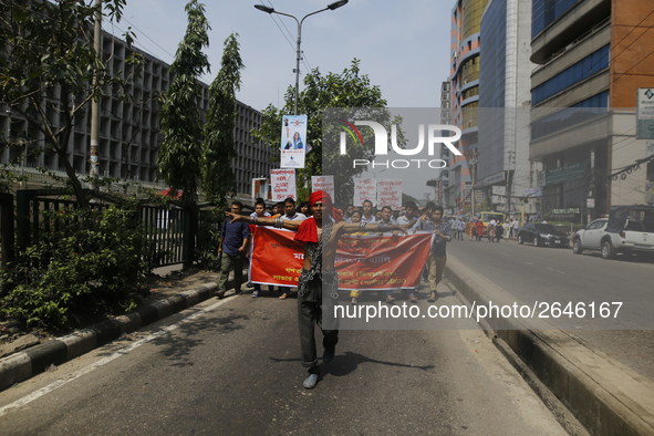 Bangladeshi workers shout slogans as they attend a May Day protest rally in Dhaka, Bangladesh on May 01, 2018. Thousands of workers of sever...