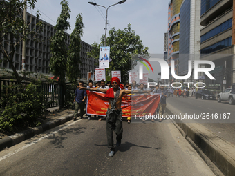 Bangladeshi workers shout slogans as they attend a May Day protest rally in Dhaka, Bangladesh on May 01, 2018. Thousands of workers of sever...