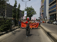 Bangladeshi workers shout slogans as they attend a May Day protest rally in Dhaka, Bangladesh on May 01, 2018. Thousands of workers of sever...