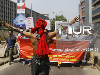 Bangladeshi workers shout slogans as they attend a May Day protest rally in Dhaka, Bangladesh on May 01, 2018. Thousands of workers of sever...