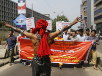 Bangladeshi workers shout slogans as they attend a May Day protest rally in Dhaka, Bangladesh on May 01, 2018. Thousands of workers of sever...