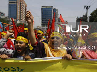 Bangladeshi workers shout slogans as they attend a May Day protest rally in Dhaka, Bangladesh on May 01, 2018. Thousands of workers of sever...