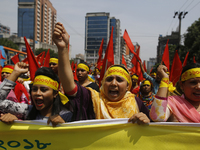 Bangladeshi workers shout slogans as they attend a May Day protest rally in Dhaka, Bangladesh on May 01, 2018. Thousands of workers of sever...