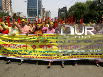 Bangladeshi workers shout slogans as they attend a May Day protest rally in Dhaka, Bangladesh on May 01, 2018. Thousands of workers of sever...