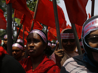 Bangladeshi garment workers take part in a May Day protest rally in Dhaka, Bangladesh on May 01, 2018. Thousands of workers of several occup...