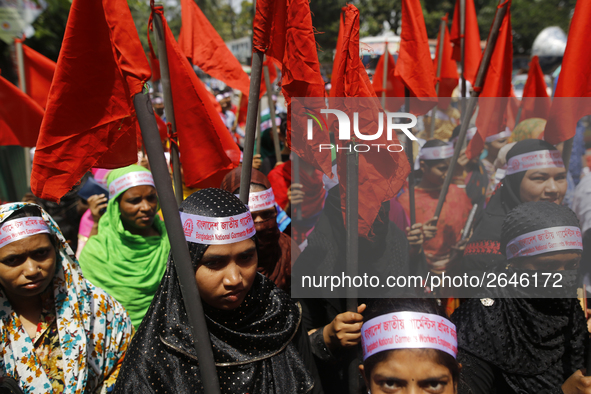 Bangladeshi garment workers take part in a May Day protest rally in Dhaka, Bangladesh on May 01, 2018. Thousands of workers of several occup...