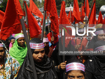 Bangladeshi garment workers take part in a May Day protest rally in Dhaka, Bangladesh on May 01, 2018. Thousands of workers of several occup...