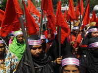 Bangladeshi garment workers take part in a May Day protest rally in Dhaka, Bangladesh on May 01, 2018. Thousands of workers of several occup...