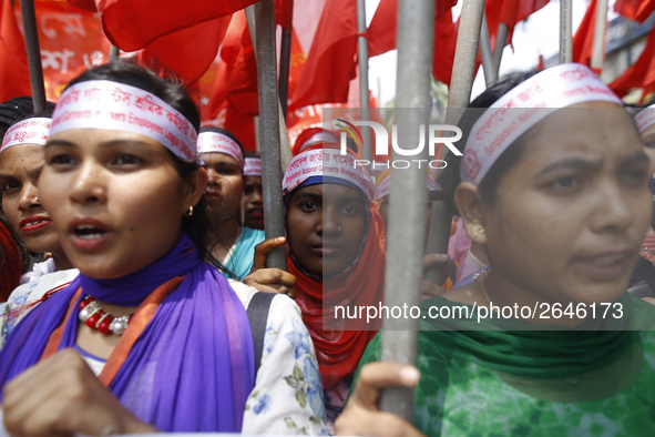 Bangladeshi garment workers take part in a May Day protest rally in Dhaka, Bangladesh on May 01, 2018. Thousands of workers of several occup...