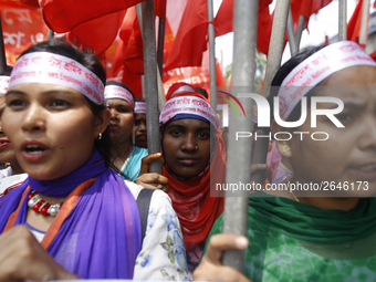 Bangladeshi garment workers take part in a May Day protest rally in Dhaka, Bangladesh on May 01, 2018. Thousands of workers of several occup...