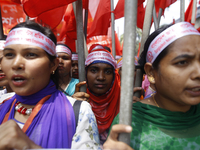 Bangladeshi garment workers take part in a May Day protest rally in Dhaka, Bangladesh on May 01, 2018. Thousands of workers of several occup...