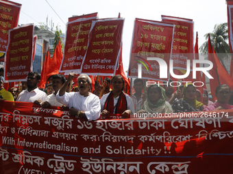 Bangladeshi workers shout slogans as they attend a May Day protest rally in Dhaka, Bangladesh on May 01, 2018. Thousands of workers of sever...