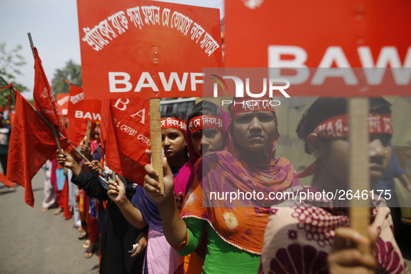 Bangladeshi garment workers take part in a May Day protest rally in Dhaka, Bangladesh on May 01, 2018. Thousands of workers of several occup...