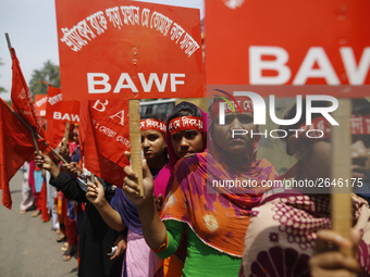 Bangladeshi garment workers take part in a May Day protest rally in Dhaka, Bangladesh on May 01, 2018. Thousands of workers of several occup...