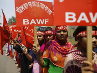 Bangladeshi garment workers take part in a May Day protest rally in Dhaka, Bangladesh on May 01, 2018. Thousands of workers of several occup...