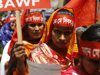 Bangladeshi garment workers take part in a May Day protest rally in Dhaka, Bangladesh on May 01, 2018. Thousands of workers of several occup...