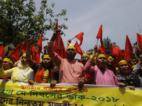 Bangladeshi workers shout slogans as they attend a May Day protest rally in Dhaka, Bangladesh on May 01, 2018. Thousands of workers of sever...