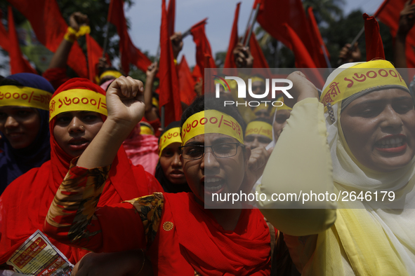 Bangladeshi workers shout slogans as they attend a May Day protest rally in Dhaka, Bangladesh on May 01, 2018. Thousands of workers of sever...