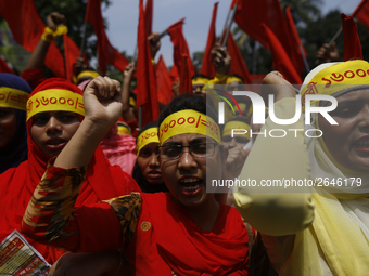 Bangladeshi workers shout slogans as they attend a May Day protest rally in Dhaka, Bangladesh on May 01, 2018. Thousands of workers of sever...