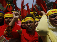 Bangladeshi workers shout slogans as they attend a May Day protest rally in Dhaka, Bangladesh on May 01, 2018. Thousands of workers of sever...