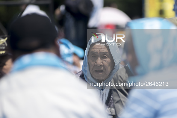 Worker shout slogans during the May Day rally sponsored by the Japanese Trade Union Confederation, known as Rengo at Yoyogi Park in Shibuya...