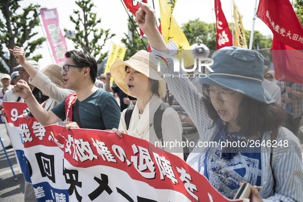 Worker shout slogans during the May Day rally sponsored by the Japanese Trade Union Confederation, known as Rengo at Yoyogi Park in Shibuya...