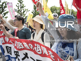 Worker shout slogans during the May Day rally sponsored by the Japanese Trade Union Confederation, known as Rengo at Yoyogi Park in Shibuya...