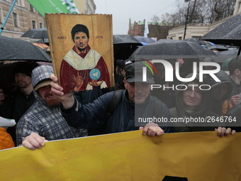 Participants in the March against the blocking of messenger "Telegram" with the icon of the founder of "Telegram" Pavel Durov during a may d...