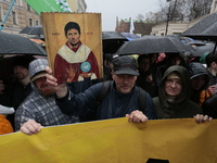 Participants in the March against the blocking of messenger "Telegram" with the icon of the founder of "Telegram" Pavel Durov during a may d...