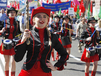 People hold red and green flags during a 1 May Day ( The International Labour Day) rally organised by the Ukrainian left-wing parties in Kie...