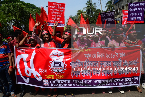 Bangladeshi garment workers and other labor organization members take part in a rally to mark May Day, International Workers' Day in Dhaka,...